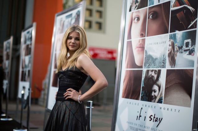 Cast member Moretz poses at the premiere of "If I Stay" in Hollywood