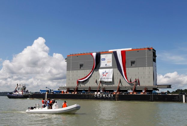 The first rolling gate for the new locks on the Pacific side of the Panama Canal is transported on a barge in Panama City
