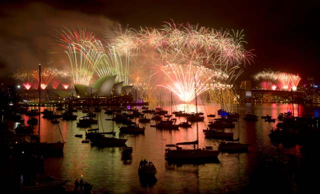 Fireworks light up the Sydney Harbour Bridge during the annual fireworks display to usher in the new year