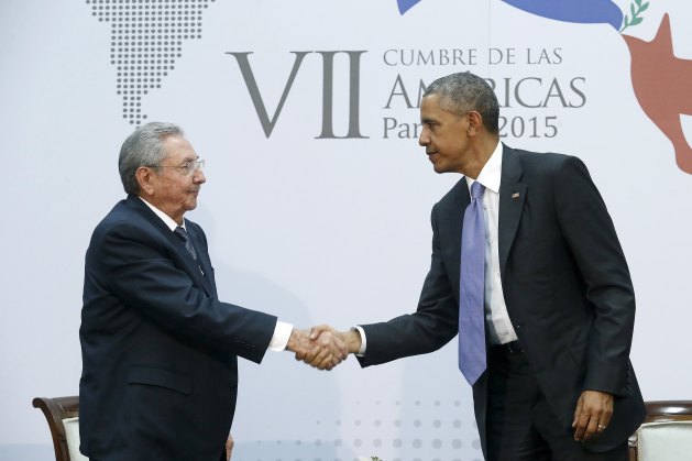 Obama shakes hands with Castro as they hold a bilateral meeting during the Summit of the Americas in Panama City