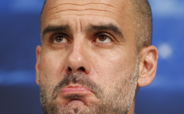 Bayern Munich head coach Guardiola addresses a news conference in Munich