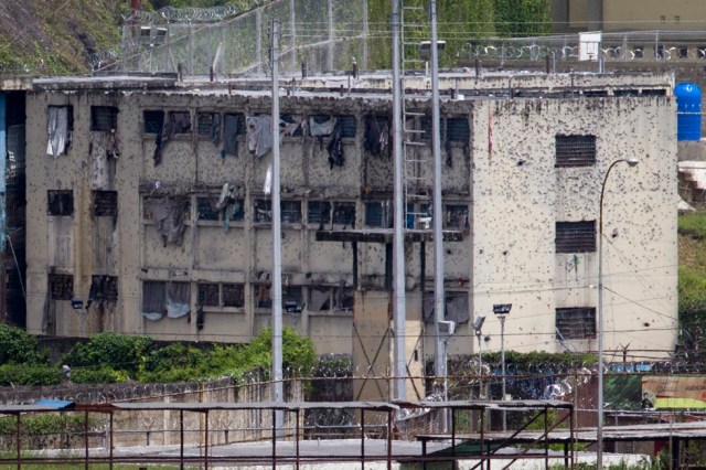 The partially destroyed facilities by gunfire of 'El Rodeo' prison is seen in Guatire outside Caracas