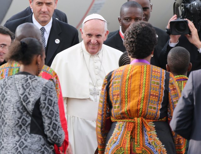 Pope Francis arrives for his first papal visit to the African Continent as head of the Catholic Church, at the Jomo Kenyatta International Airport in Nairobi November 25, 2015. REUTERS/Goran Tomasevic