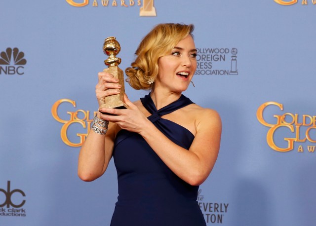 Actress Kate Winslet poses with her award for Best Performance by an Actress in a Supporting Role in any Motion Picture for her role in "Steve Jobs" backstage at the 73rd Golden Globe Awards in Beverly Hills, California January 10, 2016.  REUTERS/Lucy Nicholson