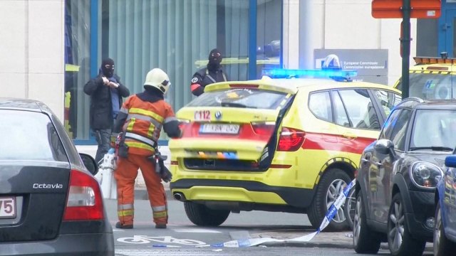 Emergency personnel are seen at the scene of a blast outside a metro station in Brussels, in this still image taken from video on March 22, 2016. REUTERS/Reuters TV TPX IMAGES OF THE DAY