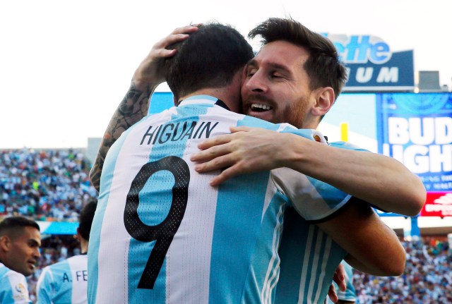 Jun 18, 2016; Foxborough, MA, USA; Argentina midfielder Lionel Messi (10) congratulates Argentina forward Gonzalo Higuain (9) after he assisted on Higuain's goal against the Venezuela during the first half of quarter-final play in the 2016 Copa America Centenario soccer tournament at Gillette Stadium. Mandatory Credit: Winslow Townson-USA TODAY Sports