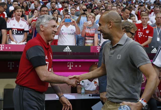 Football Soccer - Bayern Munich v Manchester City - Pre Season Friendly - Allianz Arena, Munich, Germany - 20/7/16 Manchester City manager Pep Guardiola with Bayern Munich coach Carlo Ancelotti before the match Action Images via Reuters / Michaela Rehle Livepic