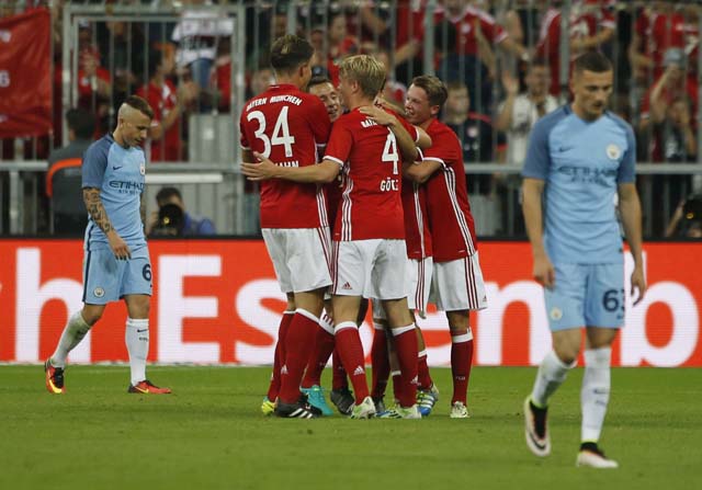 Football Soccer - Bayern Munich v Manchester City - Pre Season Friendly - Allianz Arena, Munich, Germany - 20/7/16 Erdal Ozturk celebrates with team mates after scoring the first goal for Bayern Munich Action Images via Reuters / Michaela Rehle Livepic