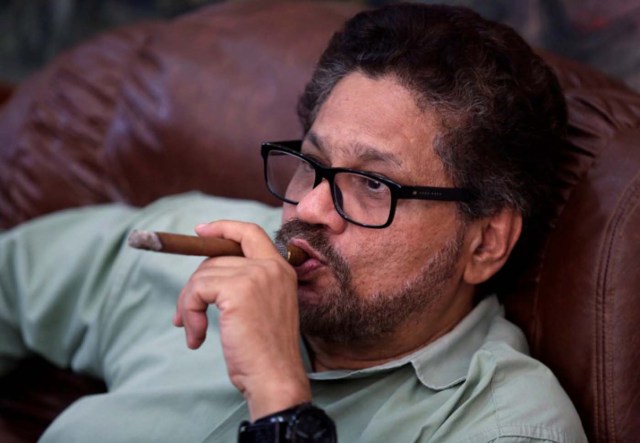 Revolutionary Armed Forces of Colombia (FARC) lead negotiator Ivan Marquez smokes a Cohiba cigar while watching a live transmission of the referendum on a peace deal, in Havana, Cuba October 2, 2016. REUTERS/Enrique de la Osa