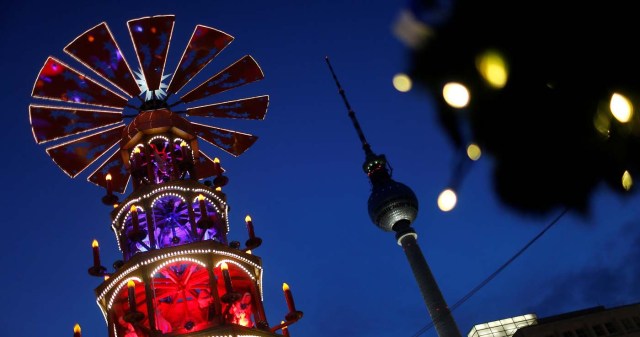 A Christmas pyramid is pictured next to the television tower at the Christmas market at Alexanderplatz square in Berlin, Germany November 21, 2016. REUTERS/Hannibal Hanschke
