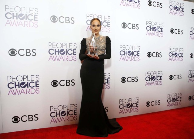 Actress Jennifer Lopez poses backstage with her award for Favorite Crime Drama TV Actress for "Shades of Blue" at the People's Choice Awards 2017 in Los Angeles, California, U.S., January 18, 2017.  REUTERS/Danny Moloshok