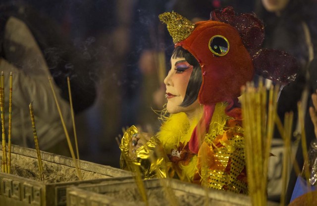 Hong Kong actress Lana Wong after planting the first stick of incense at Wong Tai Sin Temple, Hong Kong, China, January 27, 2017. Hong Kong is set to be bathed in colour and light as the Lunar New Year celebrations 2017 promise to be the territory's biggest and most spectacular ever. Mandatory Credit: Hong Kong Tourism Board via REUTERS