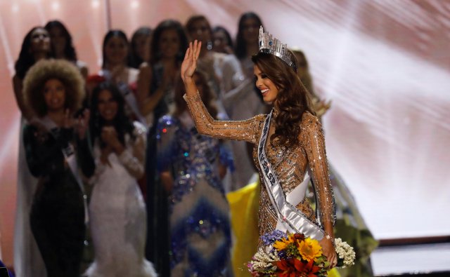 Miss France Iris Mittenaere waves after being declared winner in the Miss Universe beauty pageant at the Mall of Asia Arena, in Pasay, Metro Manila, Philippines January 30, 2017. REUTERS/Erik De Castro