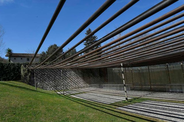 A picture taken in Olot on March 2, 2017 shows an exterior view of the restaurant "les Cols" designed by RCR architects, formed by Spanish architects, Rafael Aranda, Carme Pigem and Ramon Vialta who won yesterday the prestigious Pritzker Prize for modern works. The choice was seen as a move away from the celebrity architects that have dominated the field in favour of the homegrown vision of a trio of professionals who have worked together for 30 years in their hometown of Olot in Catalonia. / AFP PHOTO / LLUIS GENE