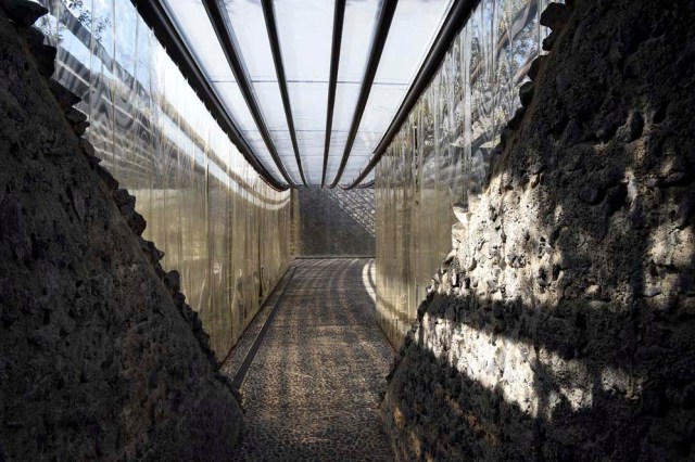 A picture taken in Olot on March 2, 2017 shows a corridor of the restaurant "les Cols" designed by RCR architects, formed by Spanish architects, Rafael Aranda, Carme Pigem and Ramon Vialta who won yesterday the prestigious Pritzker Prize for modern works. The choice was seen as a move away from the celebrity architects that have dominated the field in favour of the homegrown vision of a trio of professionals who have worked together for 30 years in their hometown of Olot in Catalonia. / AFP PHOTO / LLUIS GENE