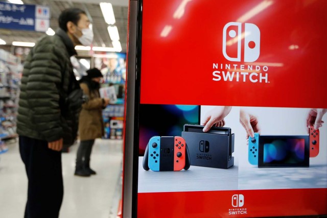 Logos of Nintendo Switch game console are seen at an electronics store in Tokyo, Japan March 3, 2017. REUTERS/Toru Hanai