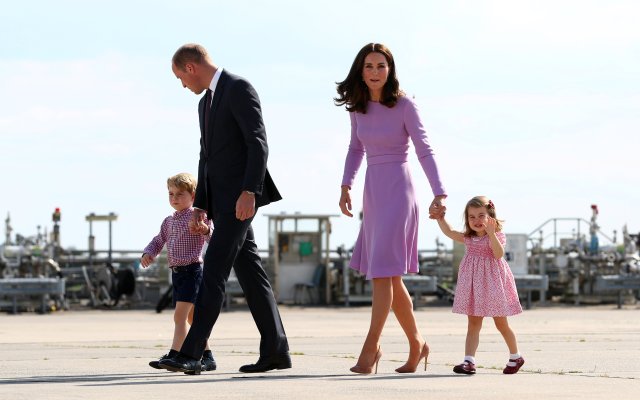 Britain's Prince William, the Duke of Cambridge, his wife Princess Catherine, the Duchess of Cambridge, Prince George and Princess Charlotte walk at the airfield in Hamburg Finkenwerder, Germany, July 21, 2017. REUTERS/Christian Charisius/Pool