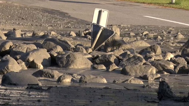 Still image taken from video shows stones blocking a street the in the remote village of Bondo in Switzerland, August 23, 2017 after a landslide struck it. REUTERS/LOCAL TEAM via Reuters TV NO ACCESS IT WEBSITES ITALY OUT SWITZERLAND OUT