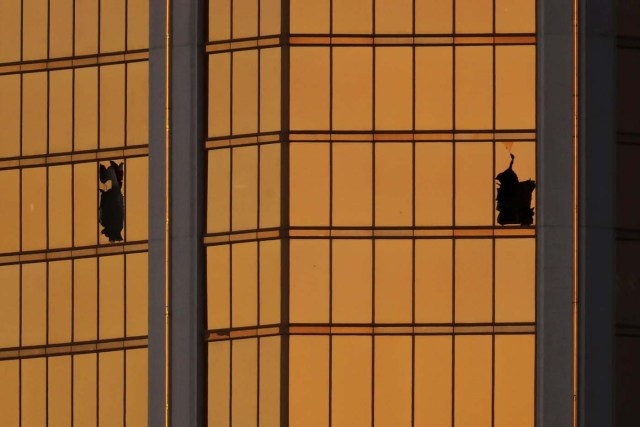 Morning light reflects off the Mandalay Bay hotel and the broken windows where shooter Stephen Paddock conducted his shooting spree from the 32nd floor in Las Vegas, Nevada, U.S., October 3, 2017. REUTERS/Mike Blake