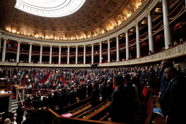 General view of the hemicycle as members of parliament observe a minute of silence in tribute to the two women who were stabbed to death Sunday in a knife attack at the main train station in Marseille and in tribute to the victims of a mass shooting at the Route 91 Harvest Country Music Festival in Las Vegas, before the questions to the government session at the National Assembly in Paris, France, October 3, 2017. REUTERS/Benoit Tessier