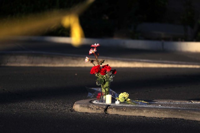 Flowers are seen next to the site of the Route 91 music festival mass shooting outside the Mandalay Bay Resort and Casino in Las Vegas, Nevada, U.S. October 3, 2017. REUTERS/Lucy Nicholson