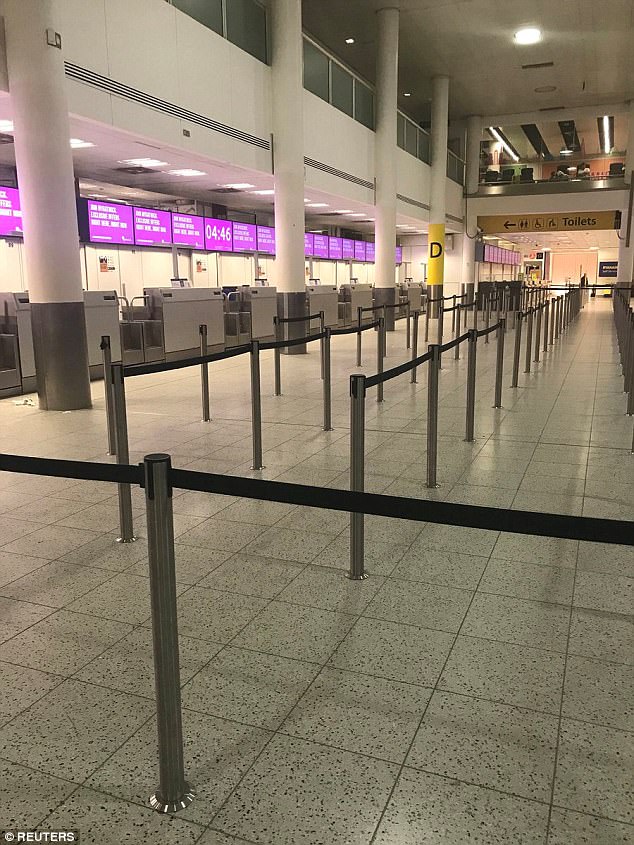 An empty check-in desk for Monarch Airlines at Gatwick Airport today as the airline ceased trading at 3am 