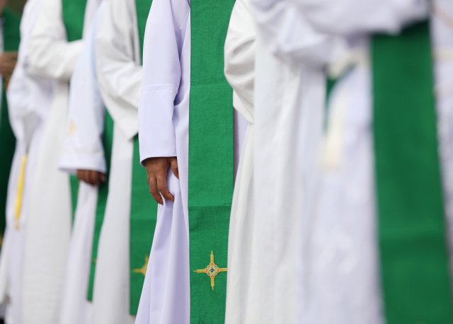 Catholic faithful attend a mass led by Pope Francis at Kyite Ka San Football Stadium in Yangon, Myanmar, November 29, 2017. REUTERS/Soe Zeya Tun