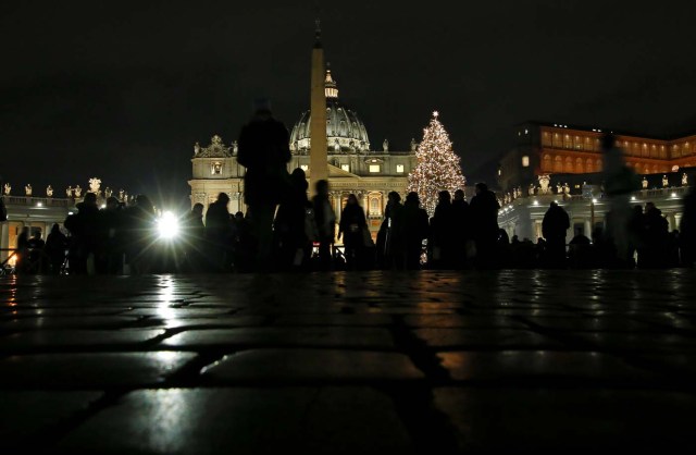 The Vatican Christmas tree is lit up after a ceremony in Saint Peter's Square at the Vatican, December 7, 2017. REUTERS/Alessandro Bianchi