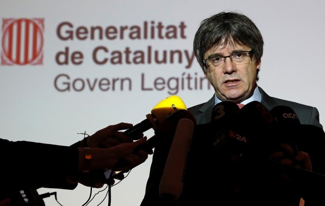 Catalonia's former President Carles Puigdemont speaks during a news conference in Brussels, Belgium, December 21, 2017. REUTERS/Yves Herman