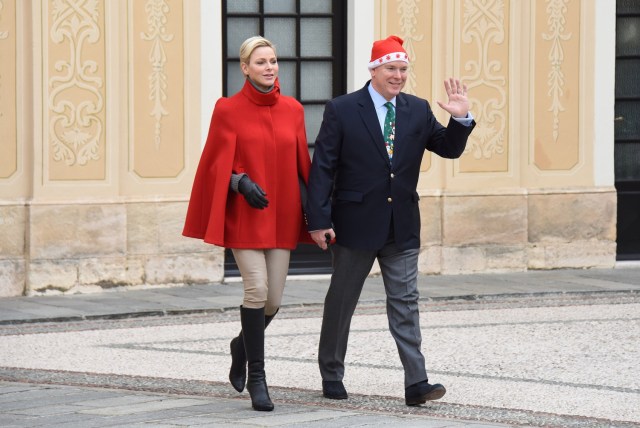Prince Albert II of Monaco and his wife Princess Charlene arrive to attend the traditional Christmas tree ceremony at the Monaco Palace as part of Christmas holiday season in Monaco, December 20, 2017. REUTERS/Jean-Pierre Amet