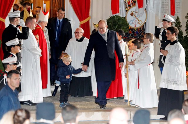 Prince Albert II of Monaco and his son Prince Jacques attend the traditional Sainte Devote celebration in Monaco, January 26, 2018. REUTERS/Eric Gaillard