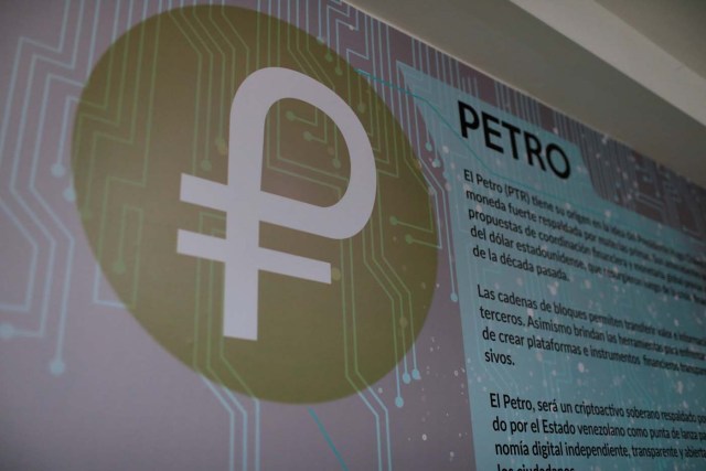 The new Venezuelan cryptocurrency "Petro" logo is seen at a facility of the Youth and Sports Ministry in Caracas, Venezuela February 23, 2018. REUTERS/Marco Bello