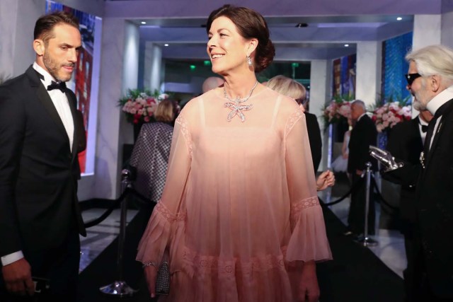 Caroline of Monaco, Princess of Hanover arrives for the annual Rose Ball at the Monte-Carlo Sporting Club in Monaco, on March 24, 2018. The Rose Ball is one of the major charity events in Monaco. Created in 1954, it benefits the Princess Grace Foundation. / AFP PHOTO / POOL / VALERY HACHE