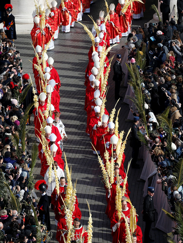 Cardinals arrive to attend the Palm Sunday Mass in Saint Peter's Square at the Vatican, March 25, 2018   REUTERS/Stefano Rellandini