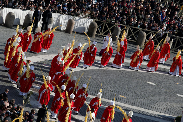 Cardinals arrive to attend the Palm Sunday Mass in Saint Peter's Square at the Vatican, March 25, 2018   REUTERS/Stefano Rellandini