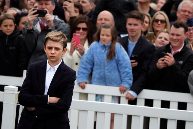 Barron Trump attends the annual White House Easter Egg Roll event on the South Lawn of the White House in Washington, U.S., April 2, 2018. REUTERS/Carlos Barria