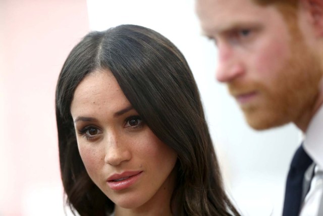 Britain's Prince Harry and his fiancee Meghan Markle attend a reception with delegates from the Commonwealth Youth Forum at the Queen Elizabeth II Conference Centre, London, April 18, 2018. Yui Mok/Pool via Reuters