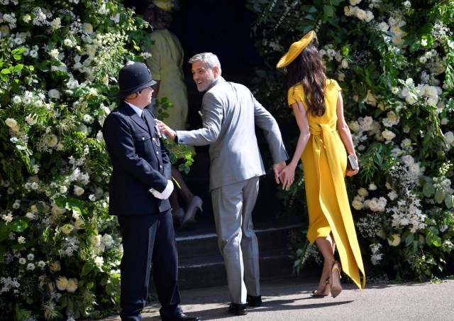 U.S. actor George Clooney and his wife, lawyer Amal Clooney arrive to the wedding of Britain's Prince Harry to Meghan Markle in Windsor, Britain, May 19, 2018. REUTERS/Toby Melville/Pool