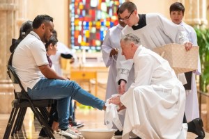 Cardinal Cupich washes feet of Venezuelan refugees in Holy Thursday ritual: ‘It was divine.’