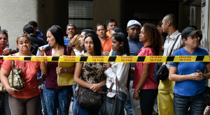 Migrantes venezolanos en Chile viven en riesgo de exclusión financiera, según estudio